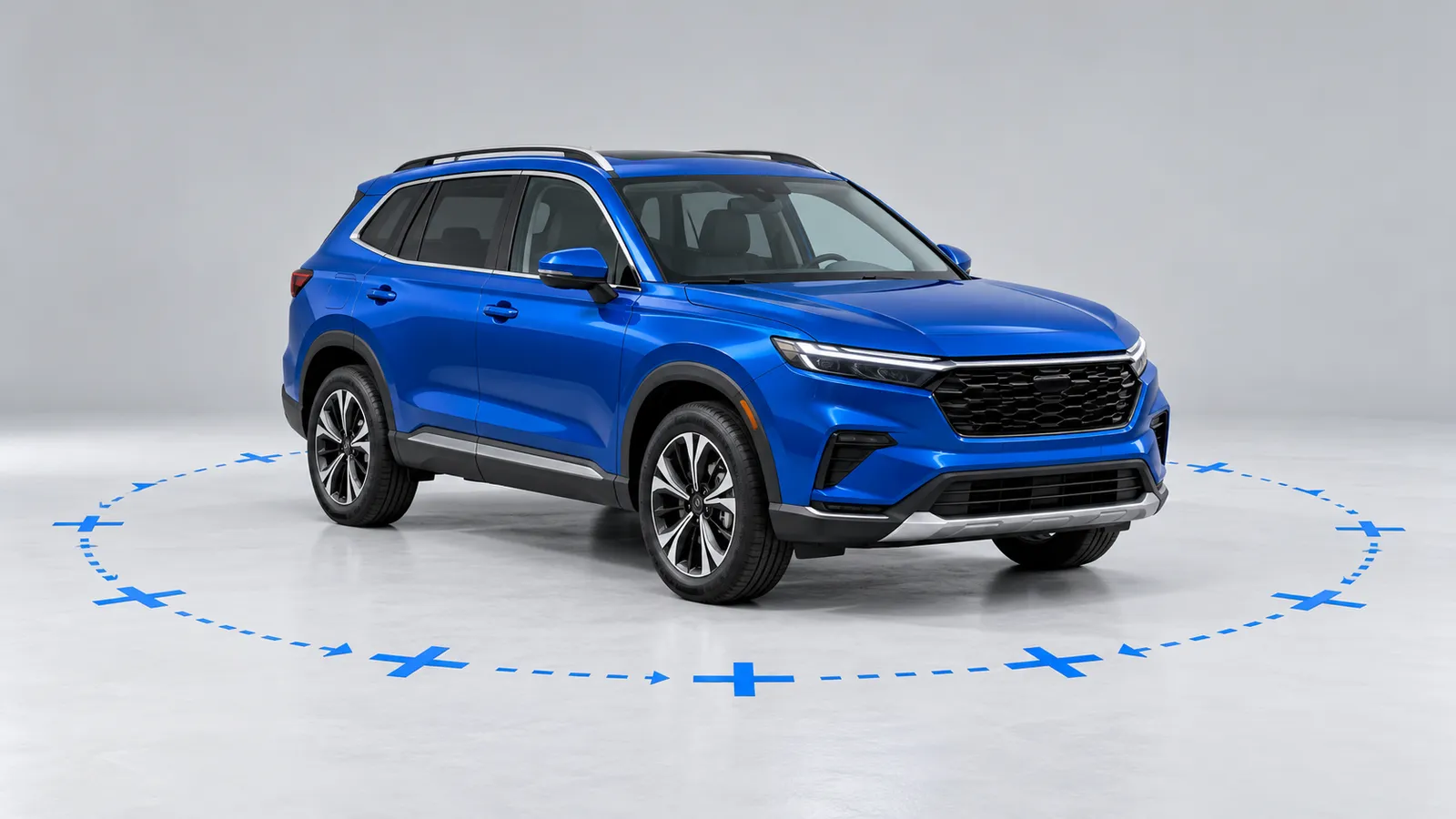 A cobalt blue SUV, shown from the front at a 45-degree angle, stands in an empty studio in front of a plain light-grey backdrop. Tape crosses form a circle on the floor around it, and a dotted arrow line links them to mark the order of camera positions for a walkaround photo set.